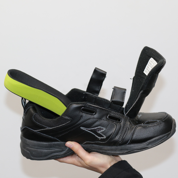 Put UCBL (plastic) or Foot Orthotic (foam) insert into shoes.